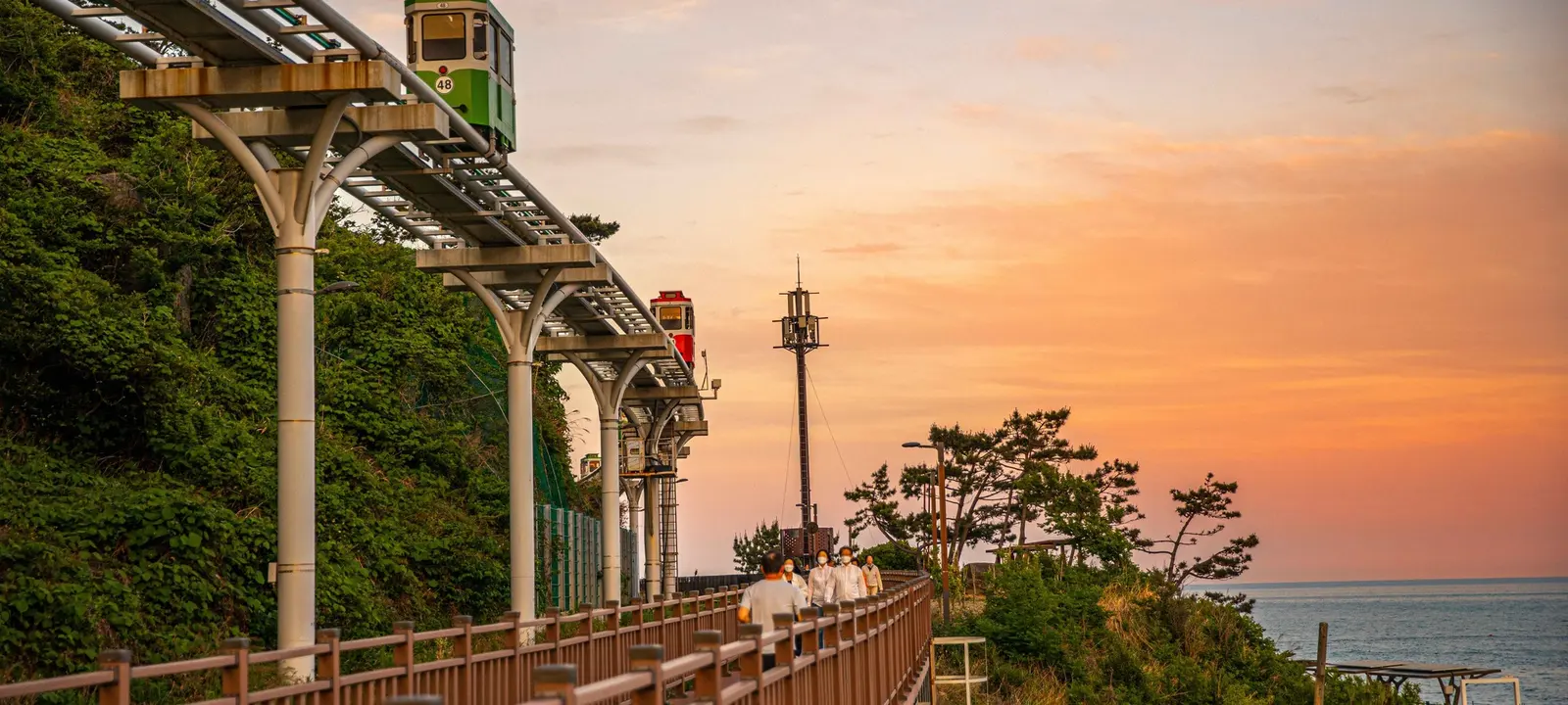 Busan coastline at sunset for seasonal event planning